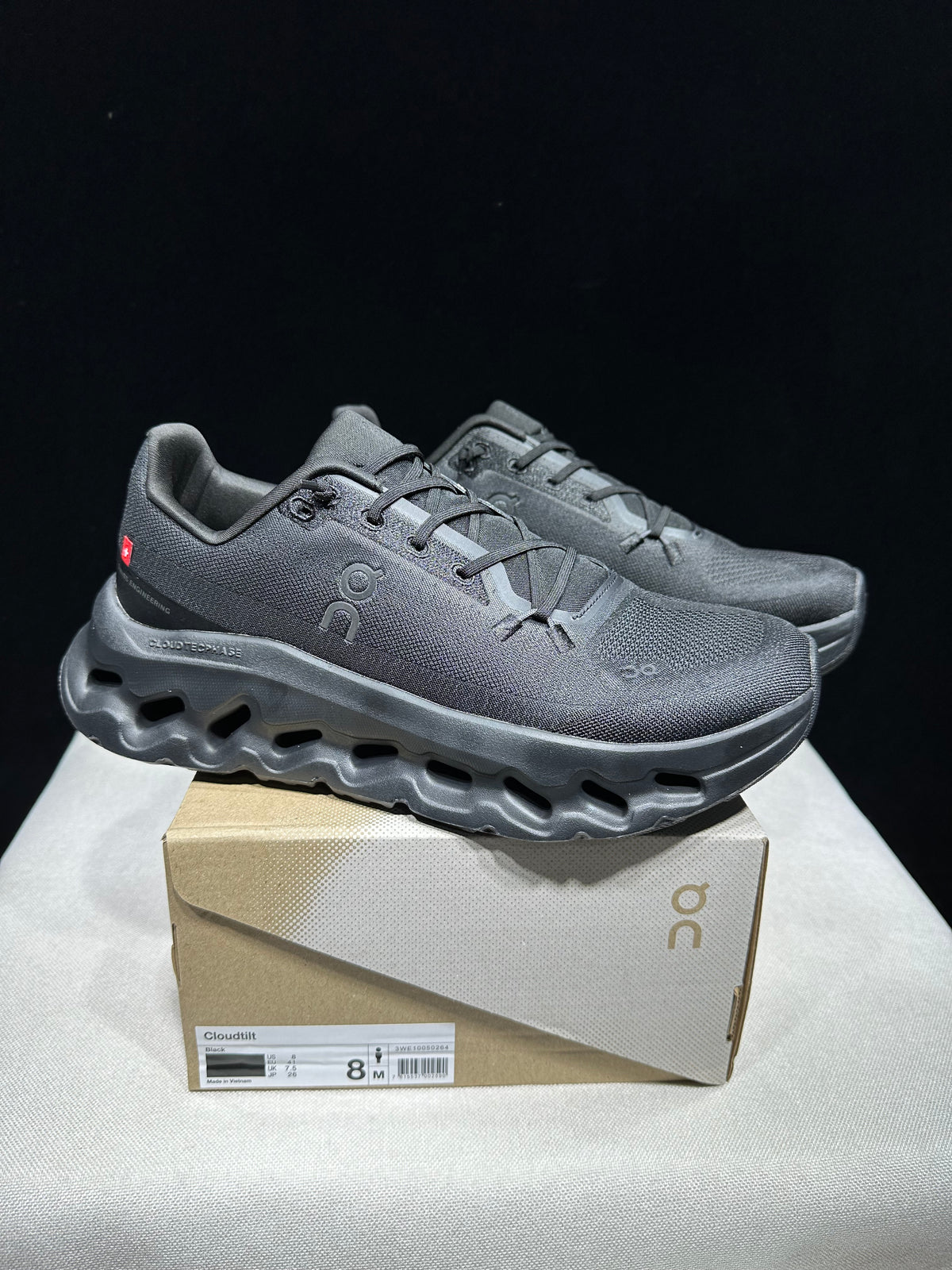 Sneakers with black on black.