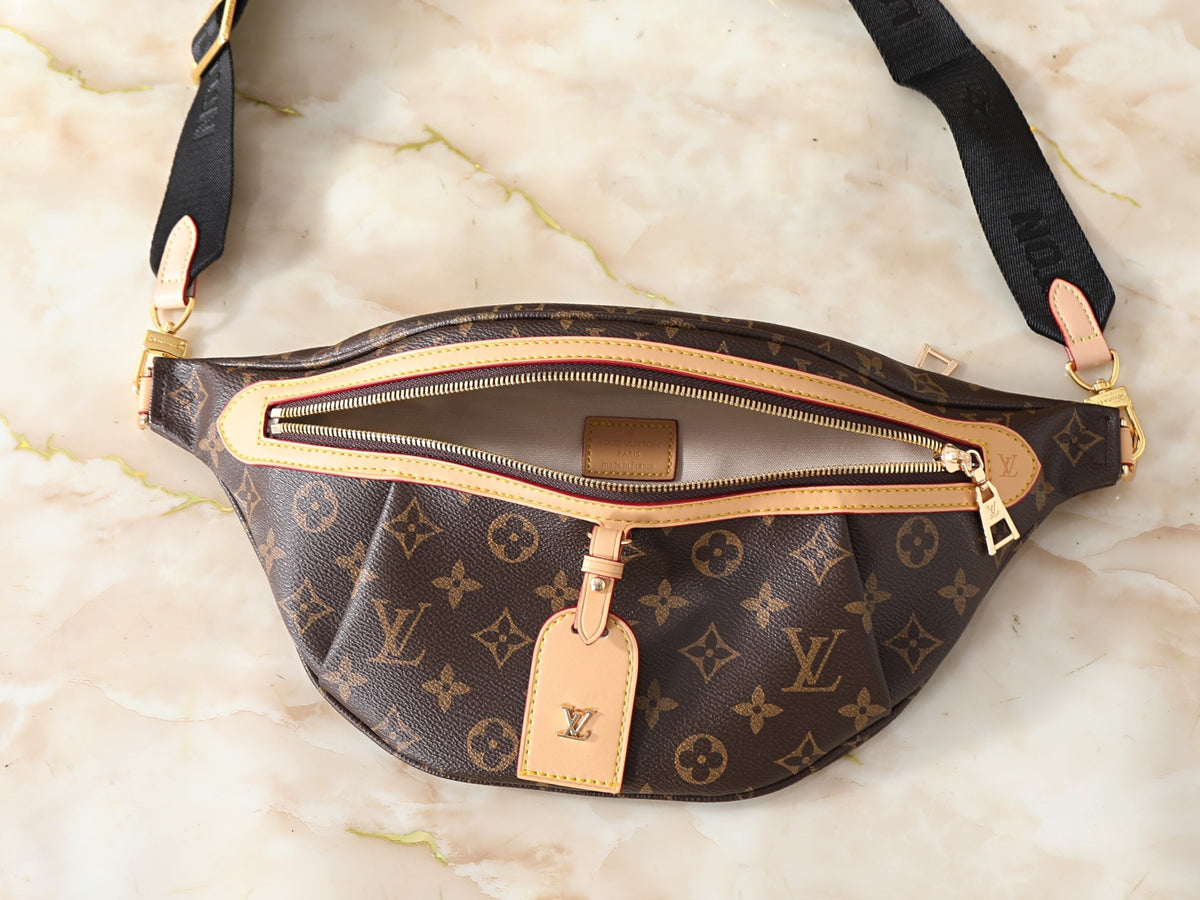Sleek and versatile, the Midnight Muse Bum Bag features a bold black strap that complements the monogram canvas for a modern street‑lux vibe. This everyday crossbody is perfect for any outfit — from athleisure to night‑out looks — making it one of your most wearable accessories.