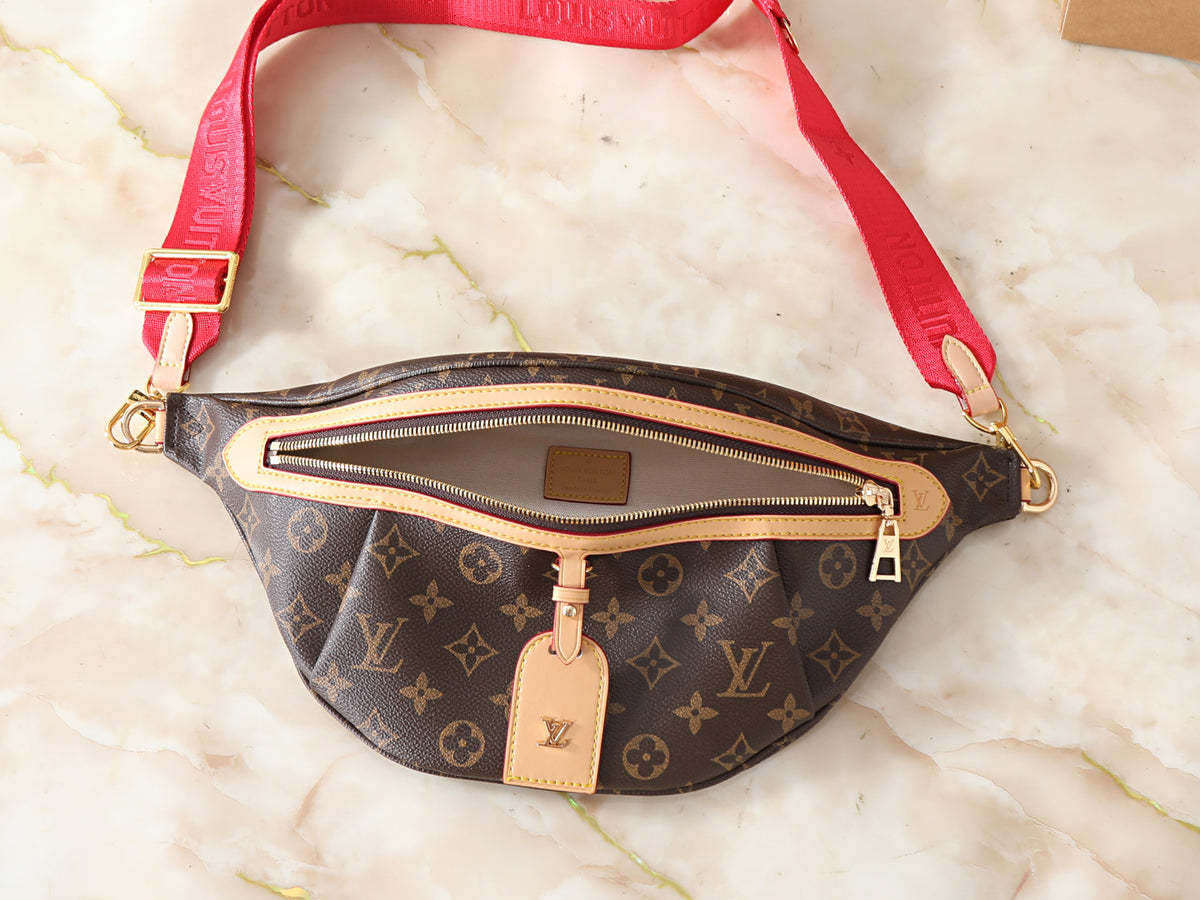 Turn heads with the Red Radiance Bum Bag, designed for bold babes who love a statement piece. This monogram bum bag features a vibrant red strap and spacious zip compartments, making it perfect for daily wear, concerts, and on‑the‑go style. Lightweight, durable, and fashion‑forward — this is your new main‑character accessory.