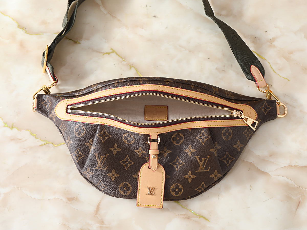 Fresh and playful, the Solid Olive Bum Bag adds a subtle pop of color to your wardrobe. The olive green strap pairs beautifully with monogram canvas, creating a unique accessory that stands out without overpowering your look. Perfect for spring outfits, festivals, and casual days.